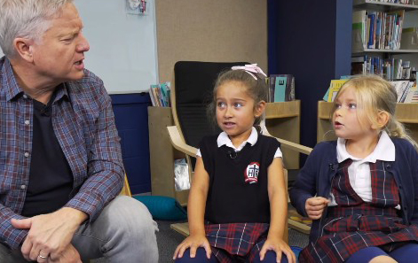 Jim Devers and young students